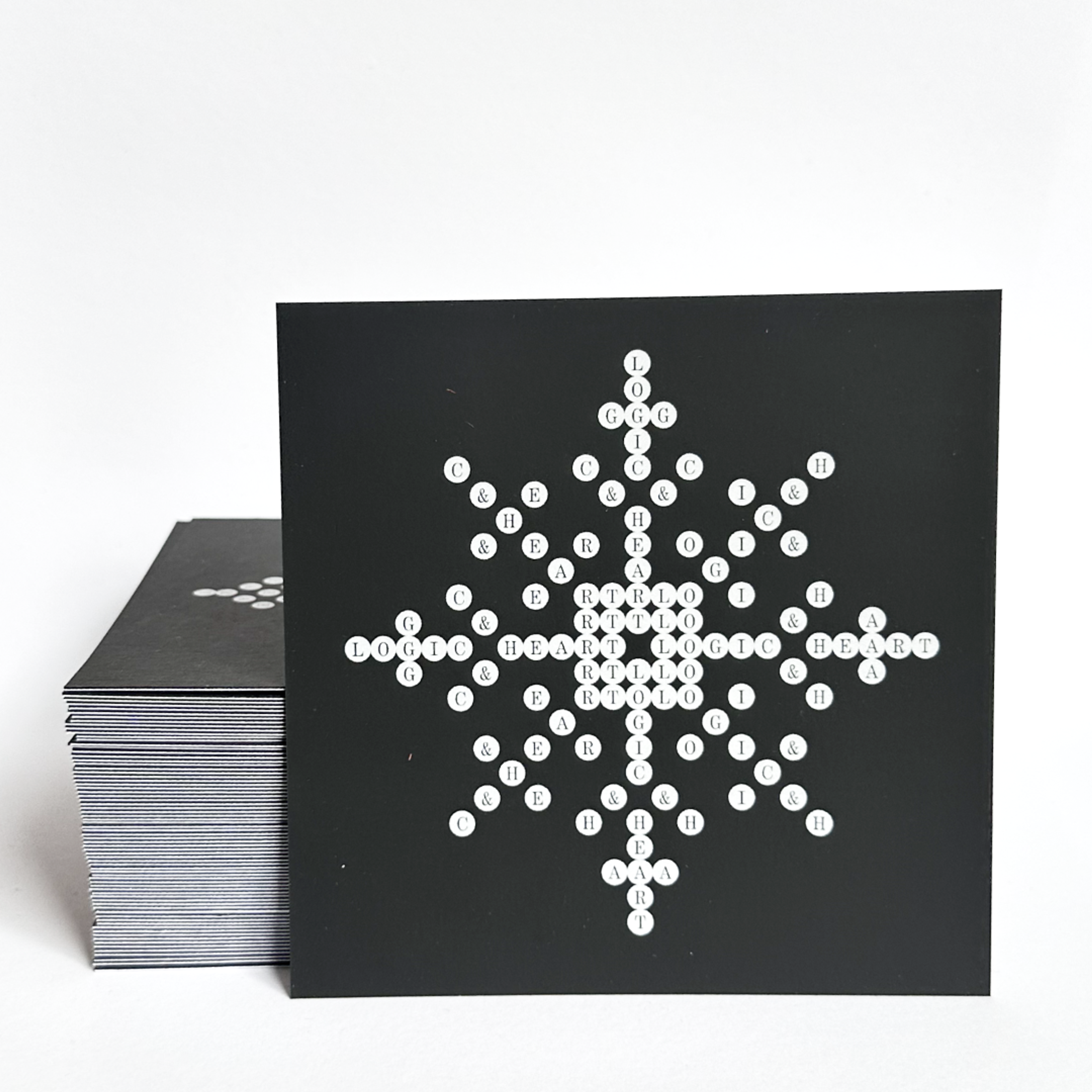white circles with letters in them. Copyright Cotton Design, Talia Cotton