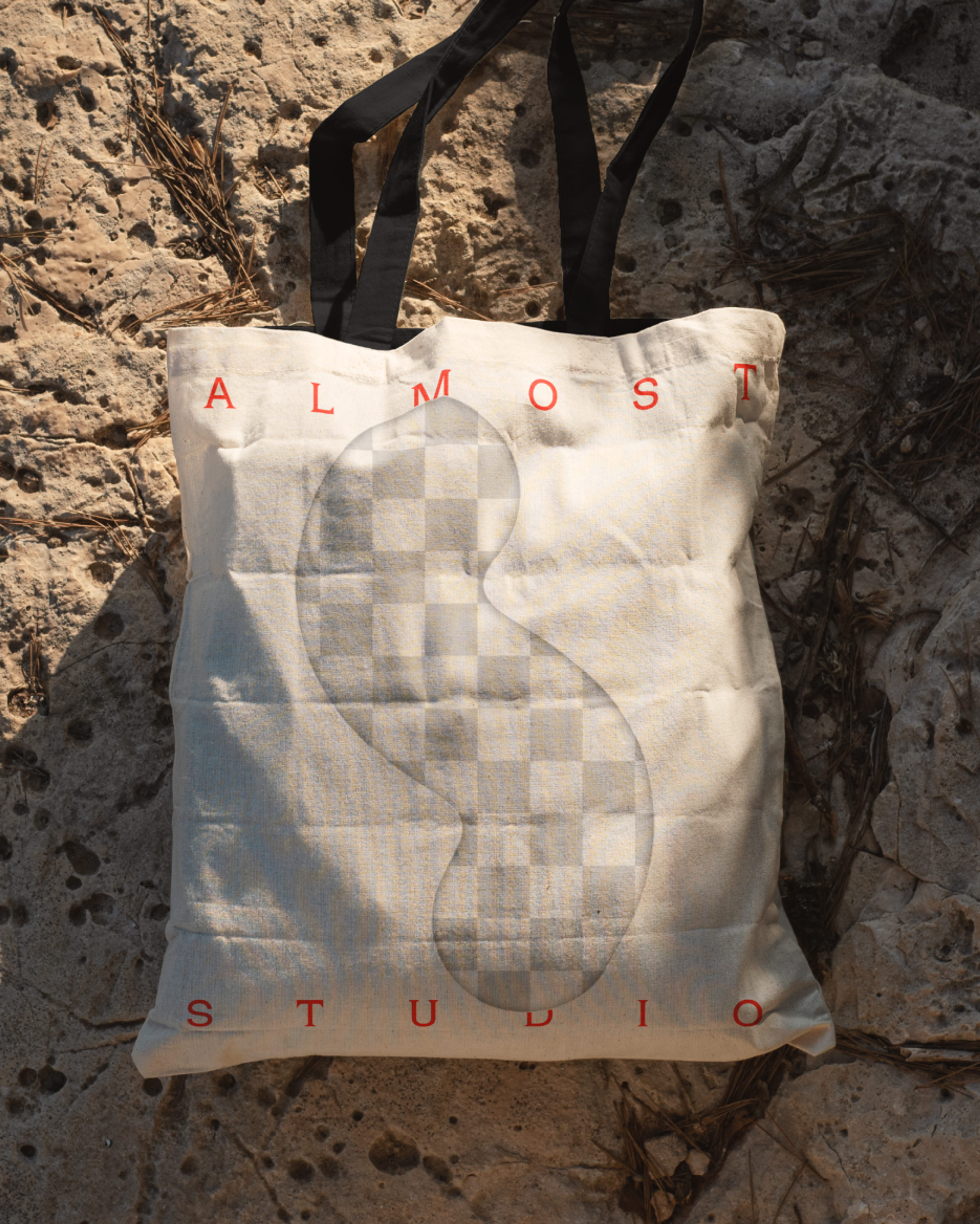 Totebag with Almost Studio logo. Copyright Cotton Design, Talia Cotton