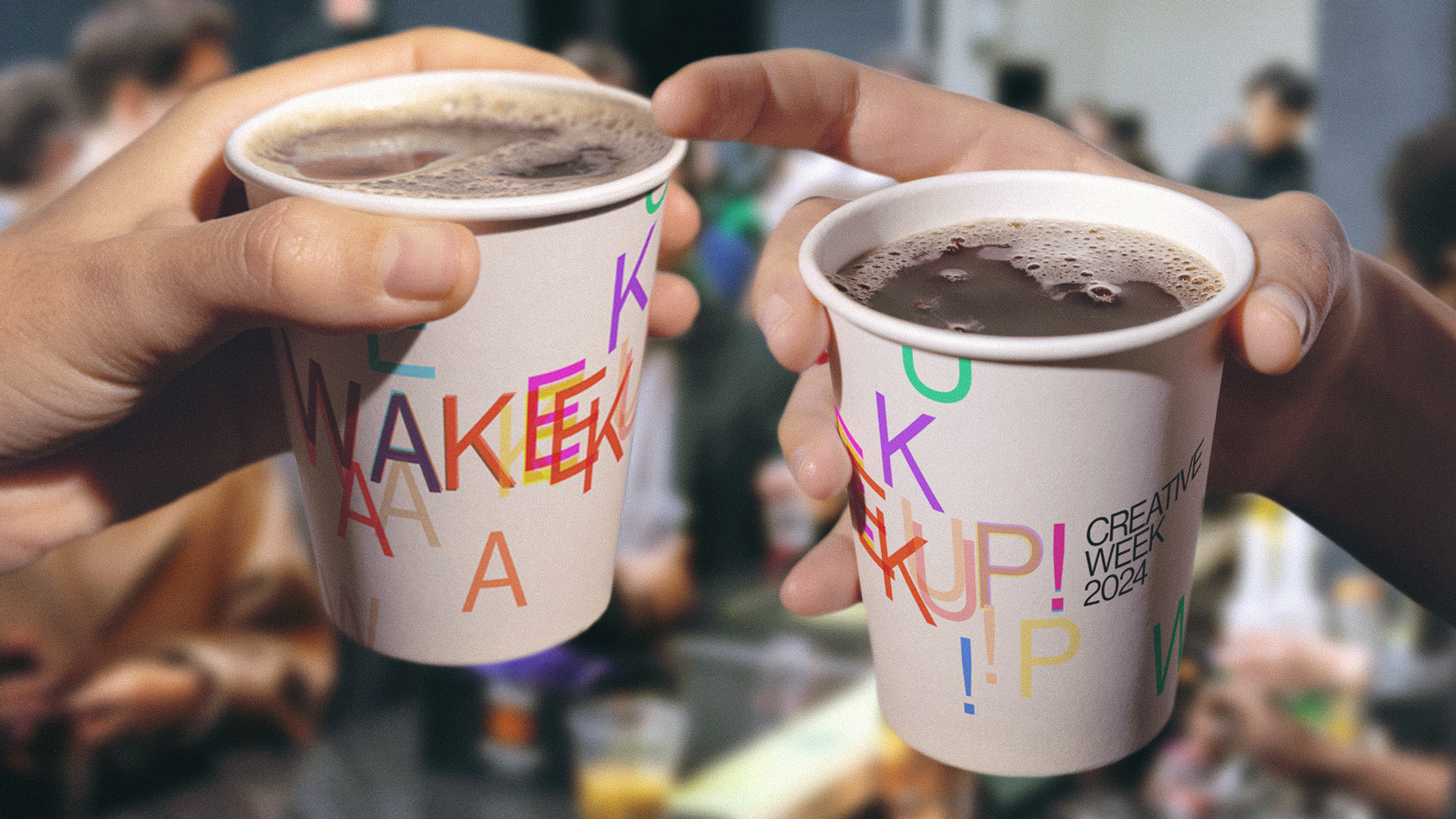 Coffee cups that say "Wake Up!" in colorful text.. Copyright Cotton Design, Talia Cotton