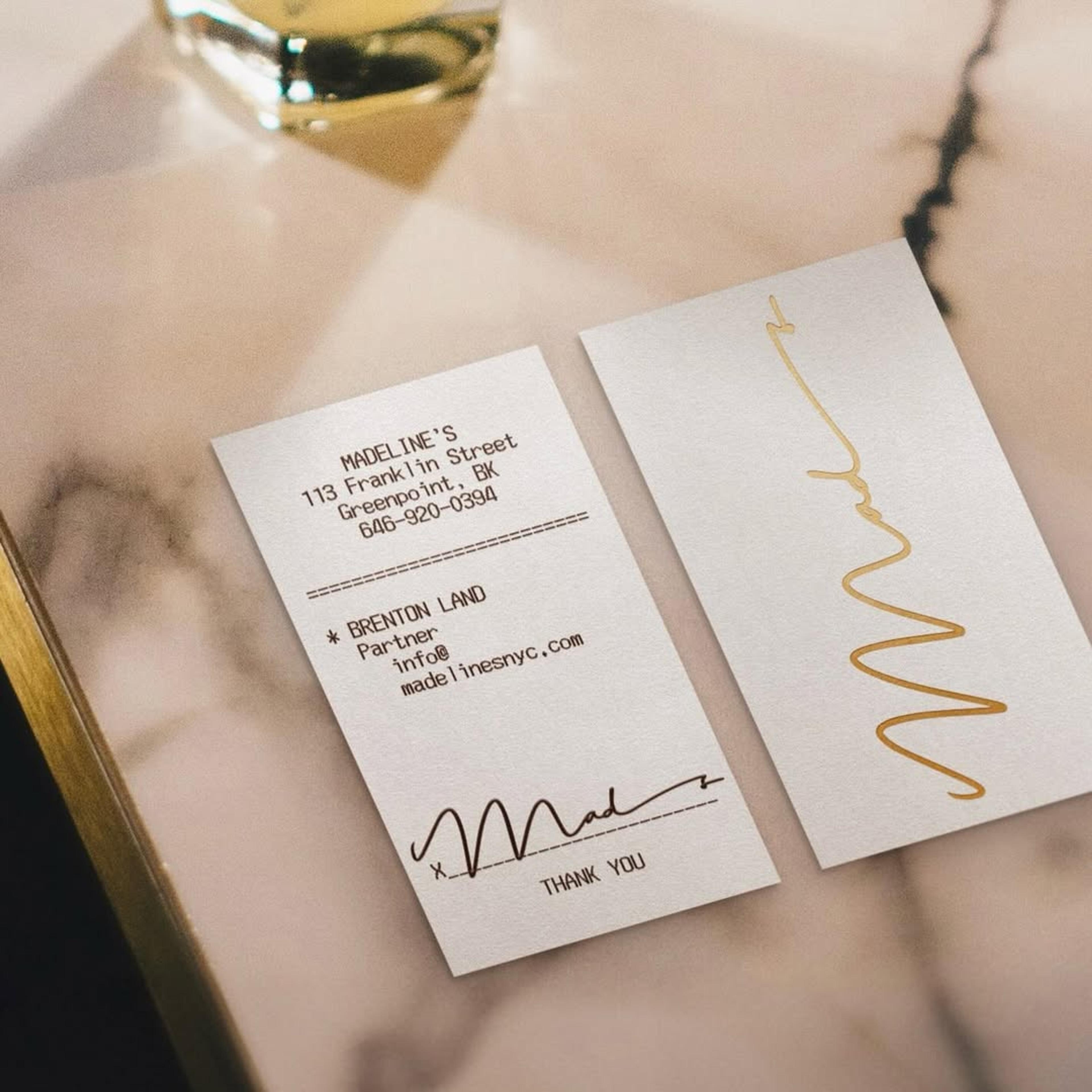 receipt on marble table. Copyright Cotton Design, Talia Cotton