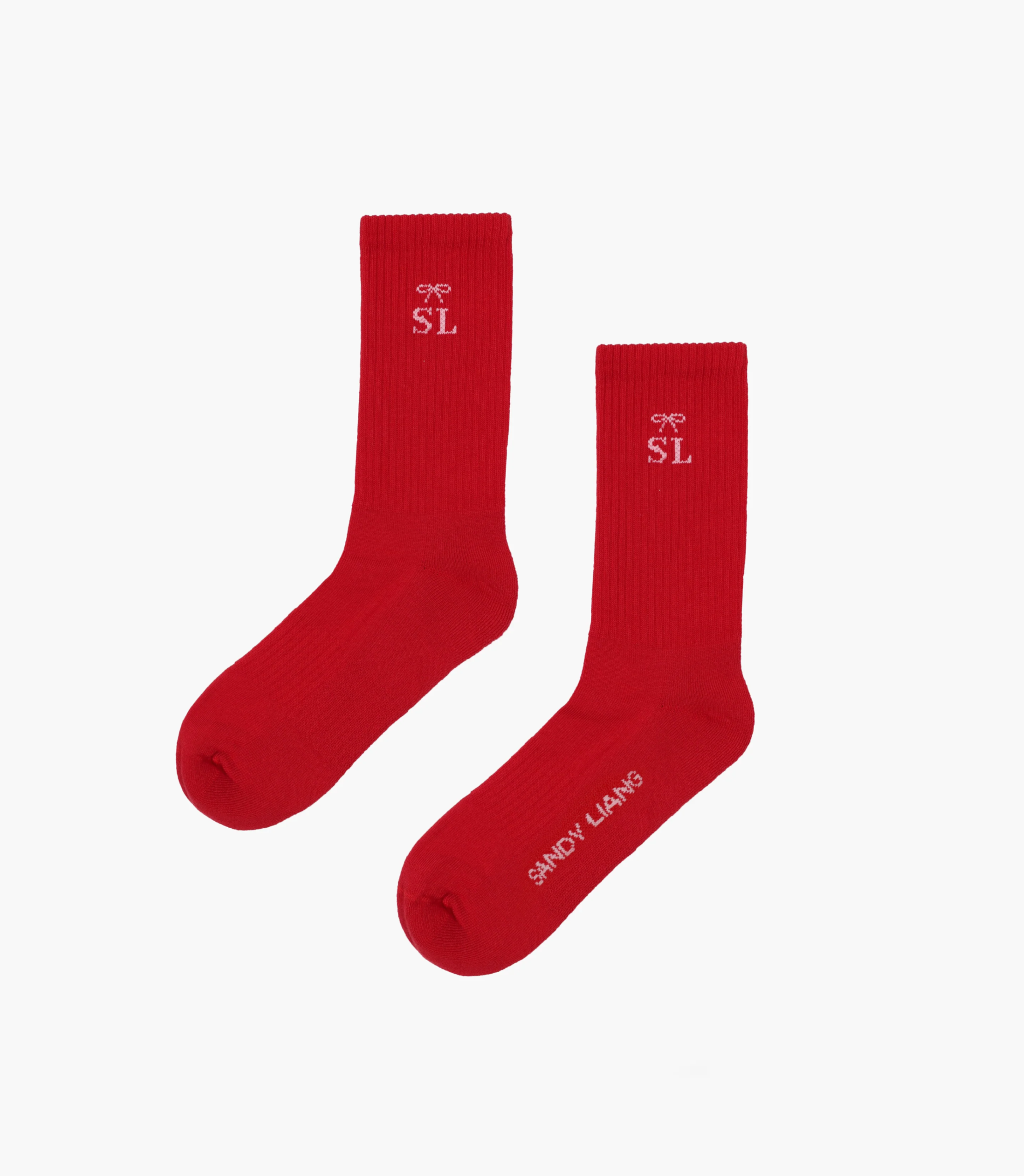 Sandy Liang red socks with "SL" acronym. Copyright Cotton Design, Talia Cotton