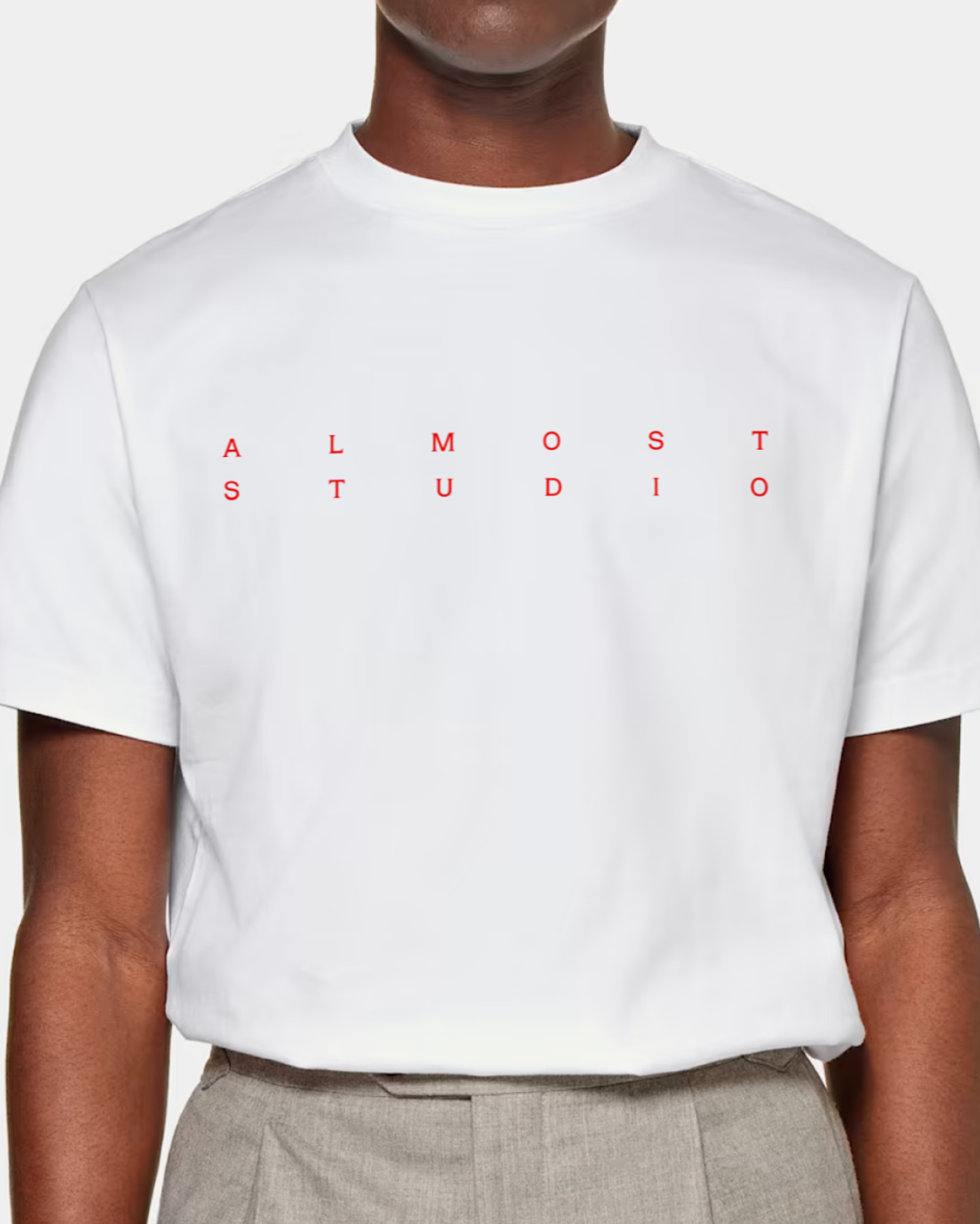 shirt with Almost Studio logo on it . Copyright Cotton Design, Talia Cotton