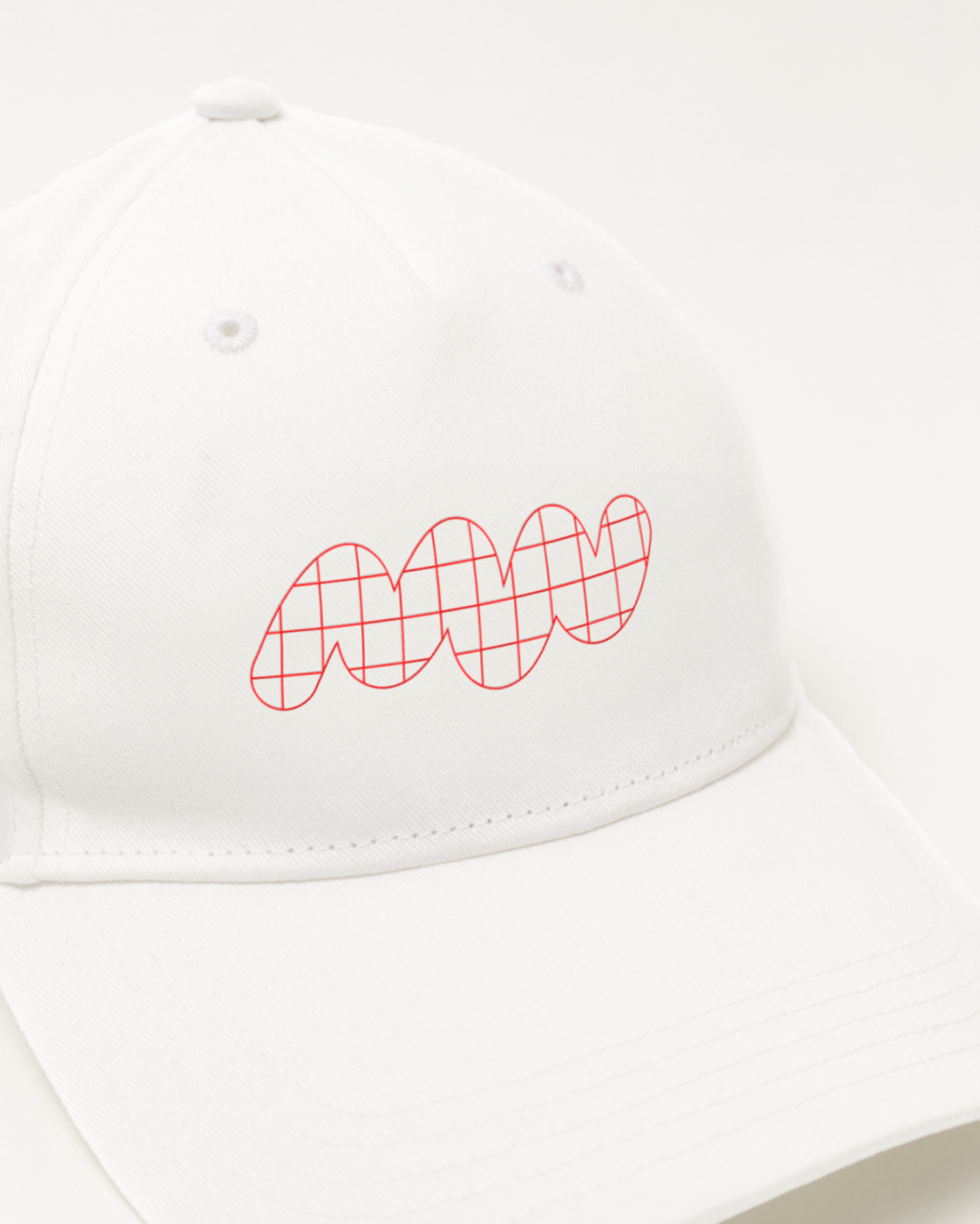 Hat with Almost Studio logo. Copyright Cotton Design, Talia Cotton
