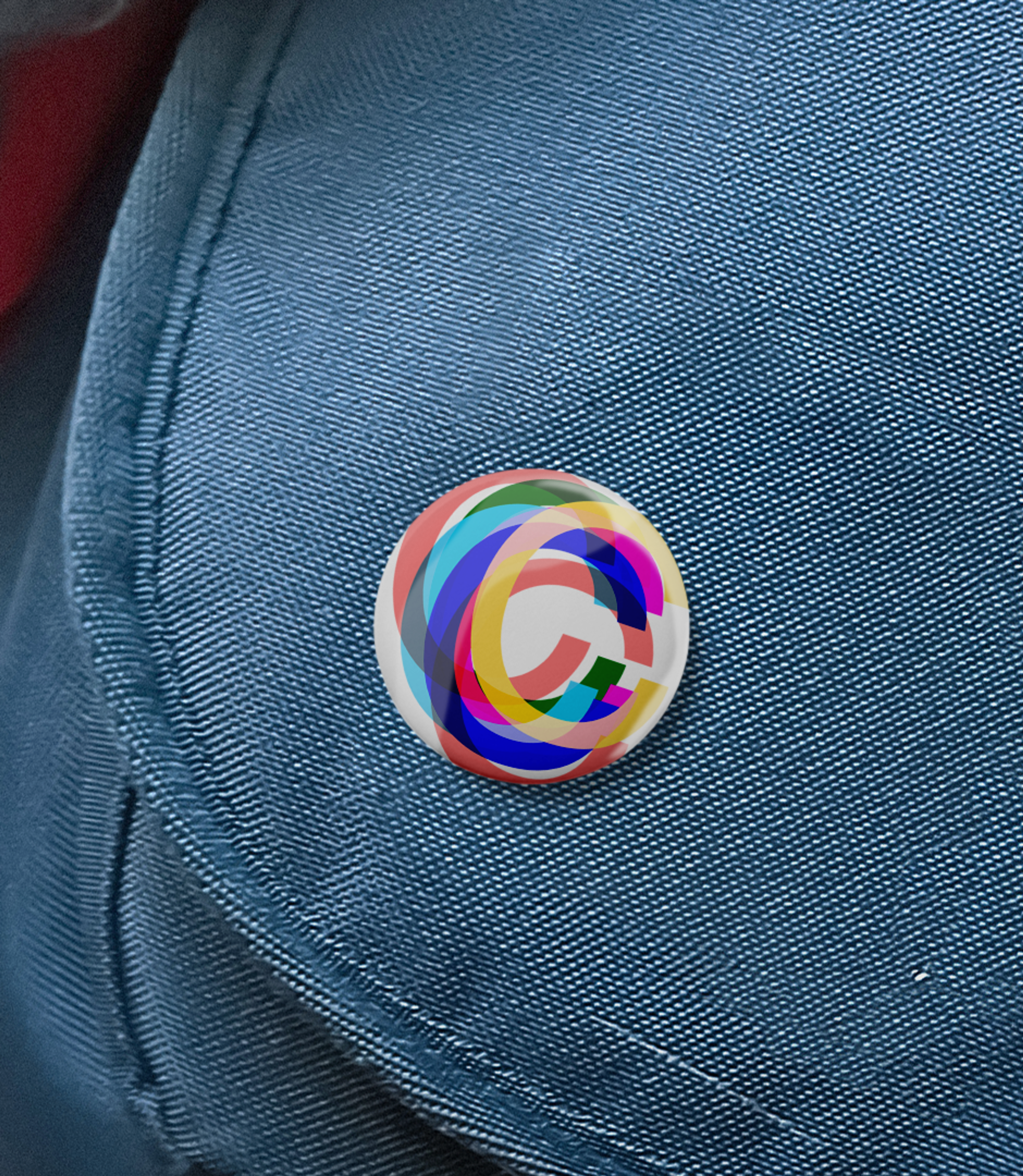 colorful button with multiple C's layered. Copyright Cotton Design, Talia Cotton