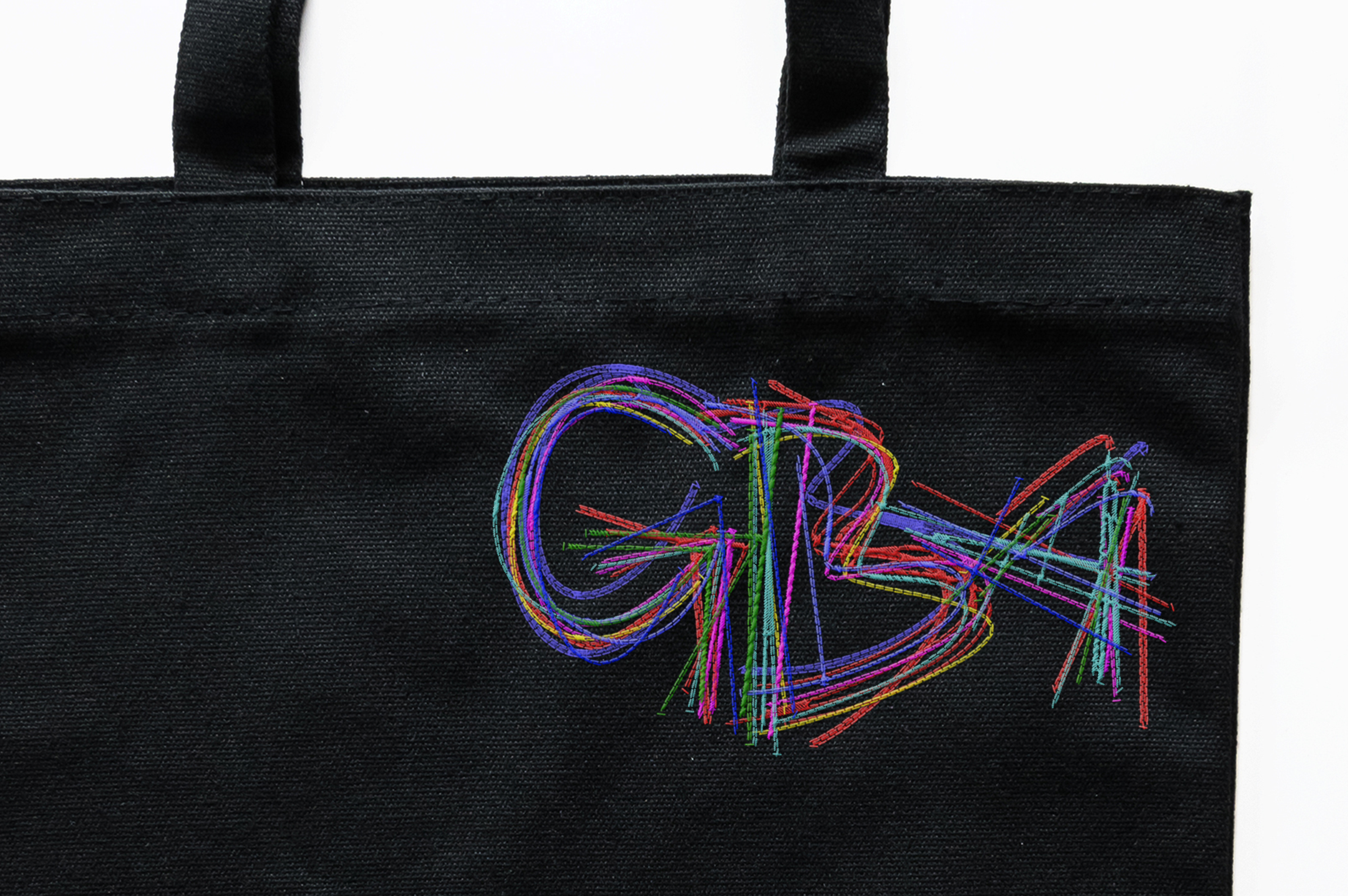 Embroidered logo bag GBA Guilty by association. Copyright Cotton Design, Talia Cotton