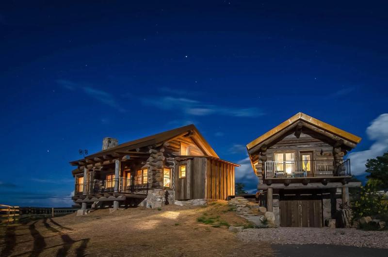 Log cabin roof with night sky