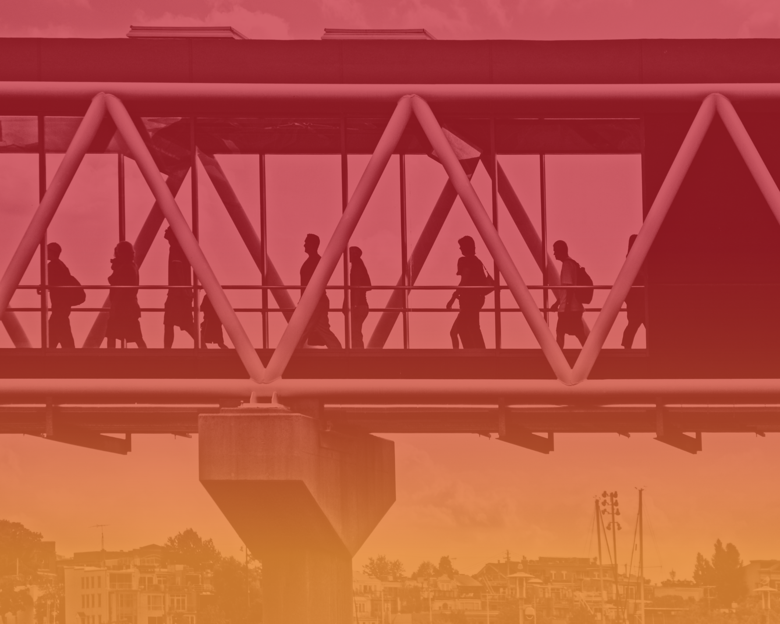 People Walking on an Elevated Footbridge in Baltimore, Maryland