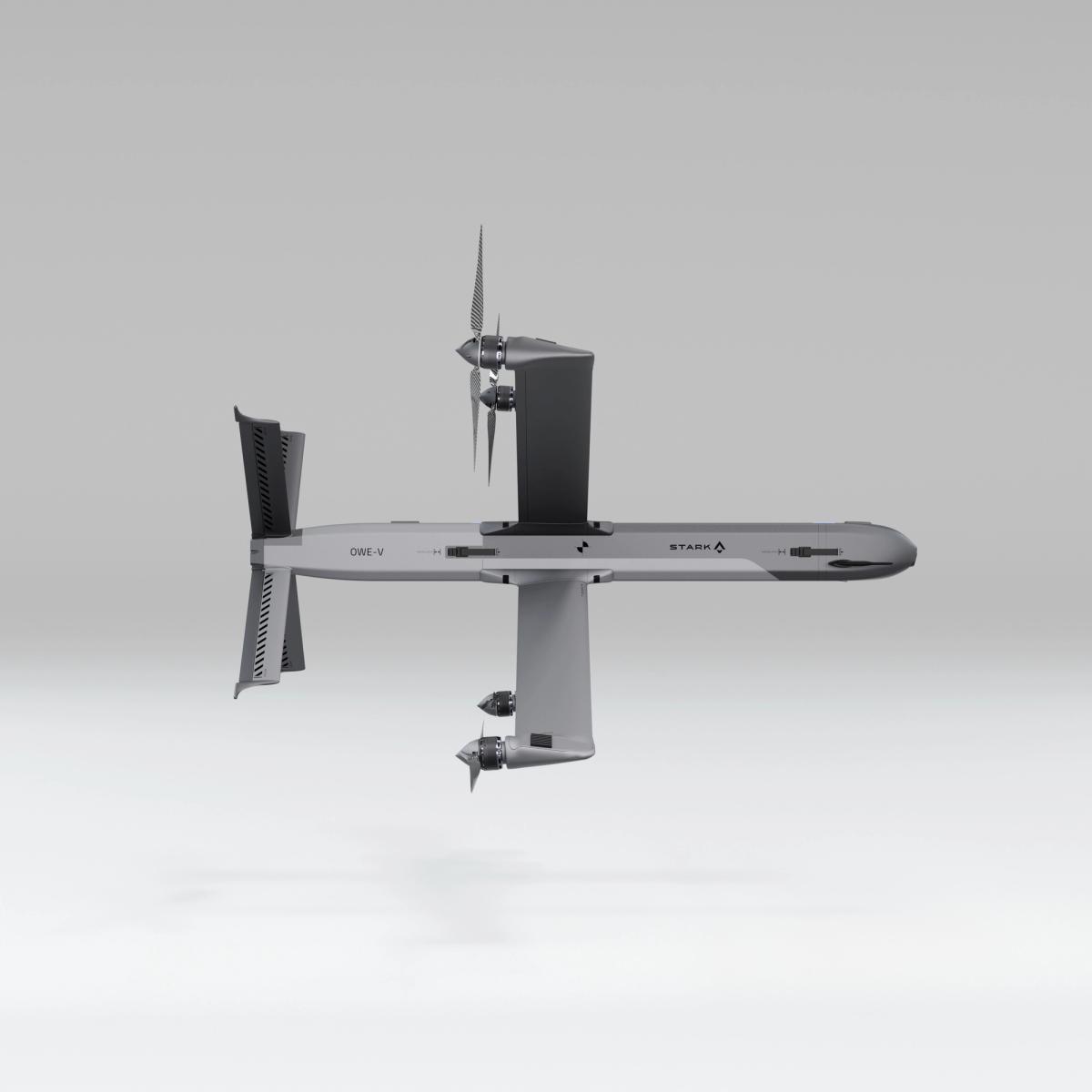 Grey drone with top and bottom propellers, tail fins, and 'ONE-V' and 'STARK 6' labels.