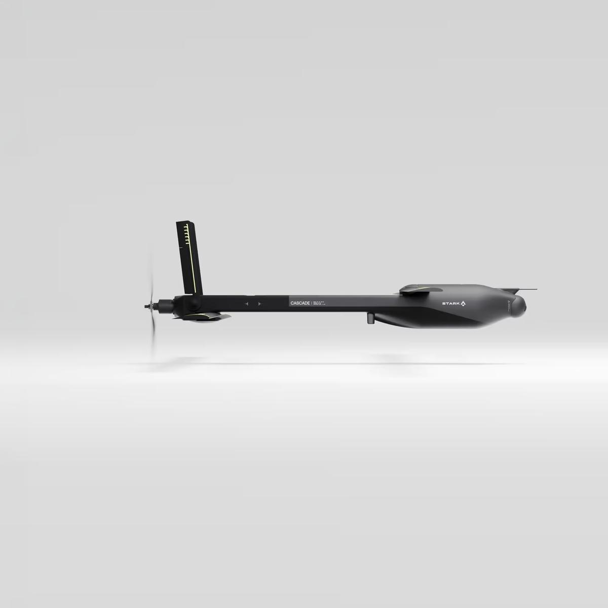 A dark grey, streamlined drone with a propeller at the rear, seen from the side.