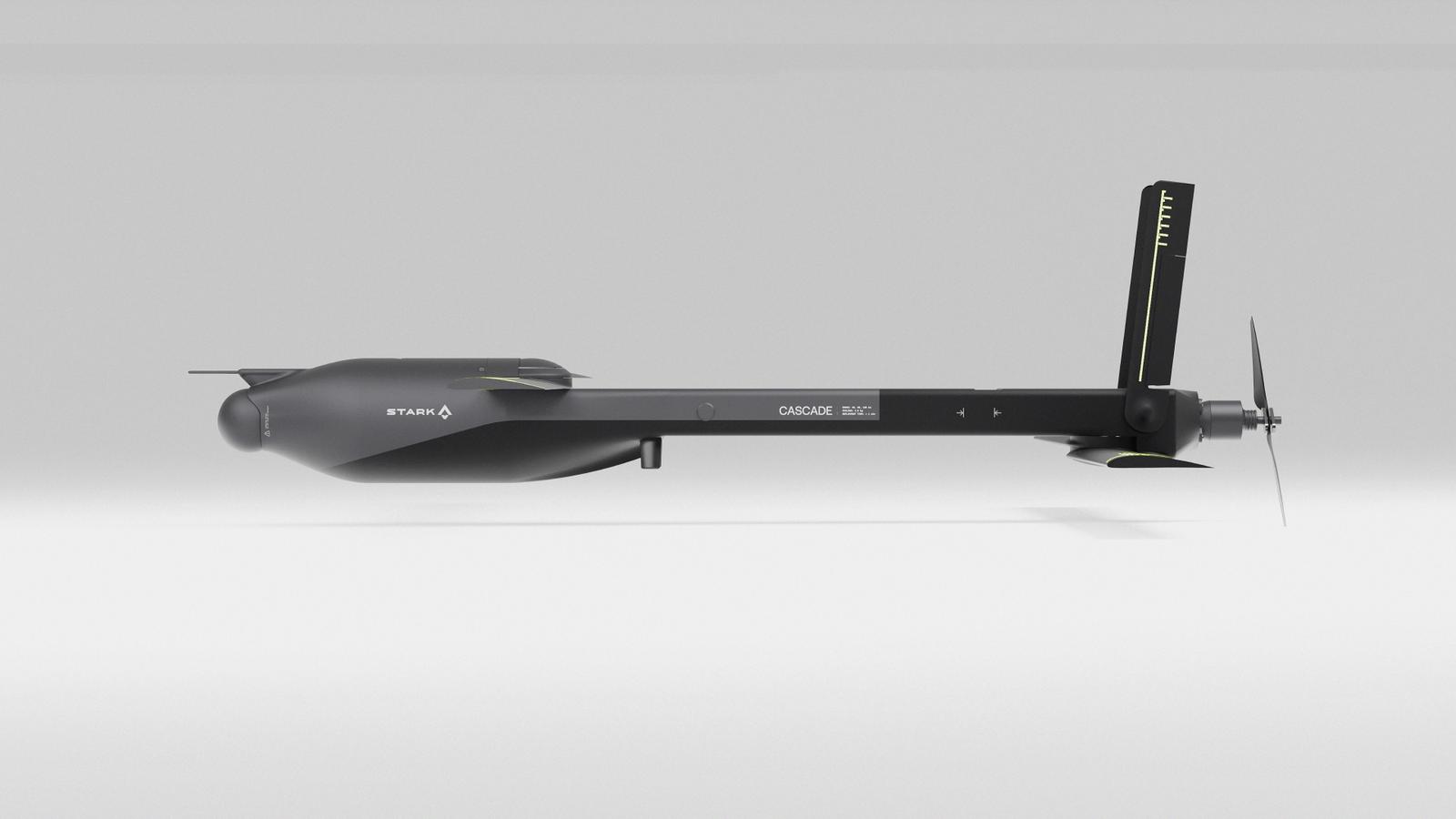 A dark grey torpedo-shaped underwater drone with a rear propeller and a vertical fin, viewed from the side.