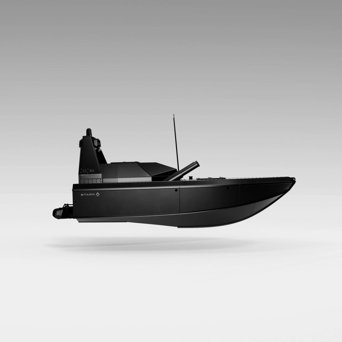 A sleek, black, angular boat with a modern design against a light grey background.