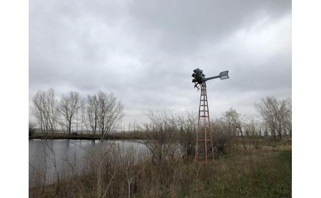Koenders windmill aerating John's trout pond east of Calgary