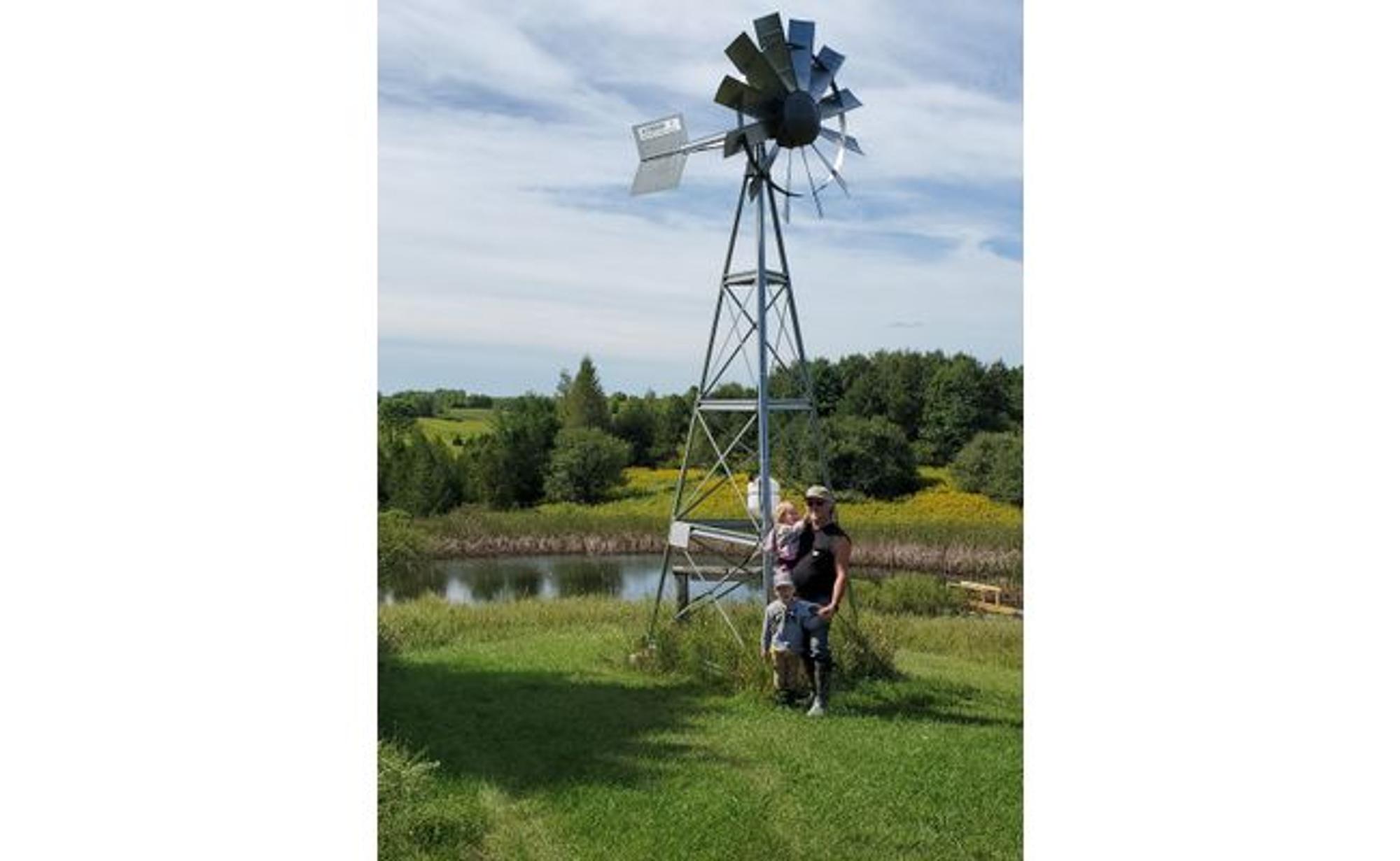 Jim and his friend erecting their Koenders windmill in Wisconsin