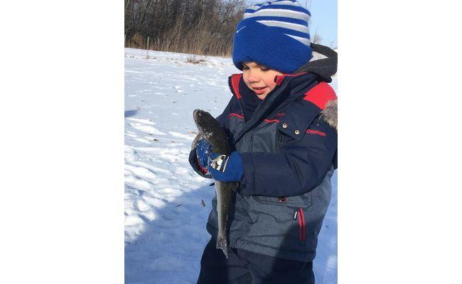 Winter ice fishing thanks to Koenders aeration keeping the pond healthy