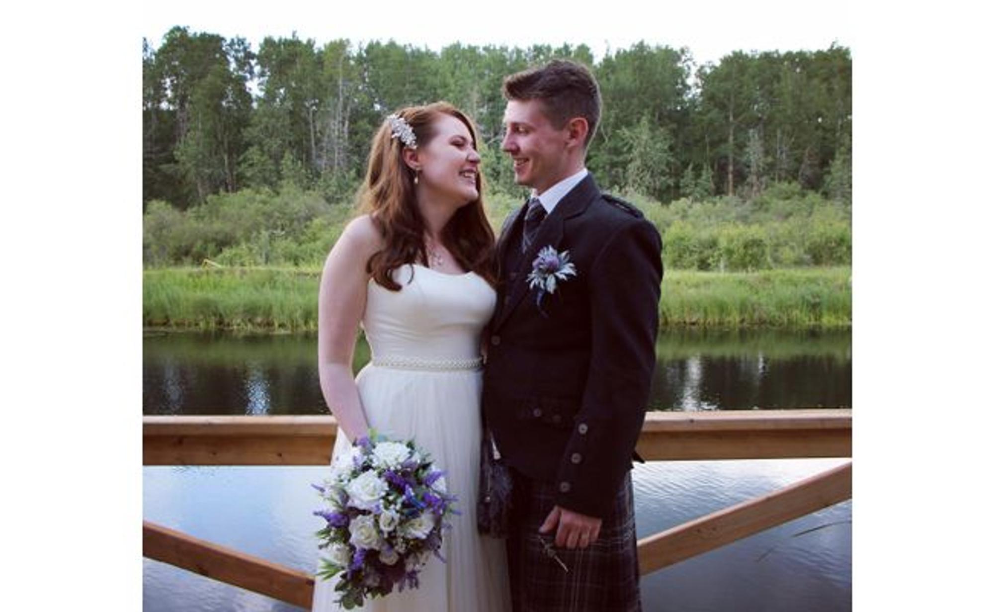 A wedding beside Dick's Koenders-aerated pond in Olds, Alberta