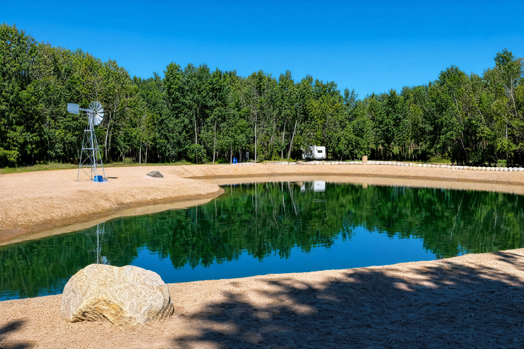 A clear pond at a lodge and campground in East Selkirk, Manitoba
