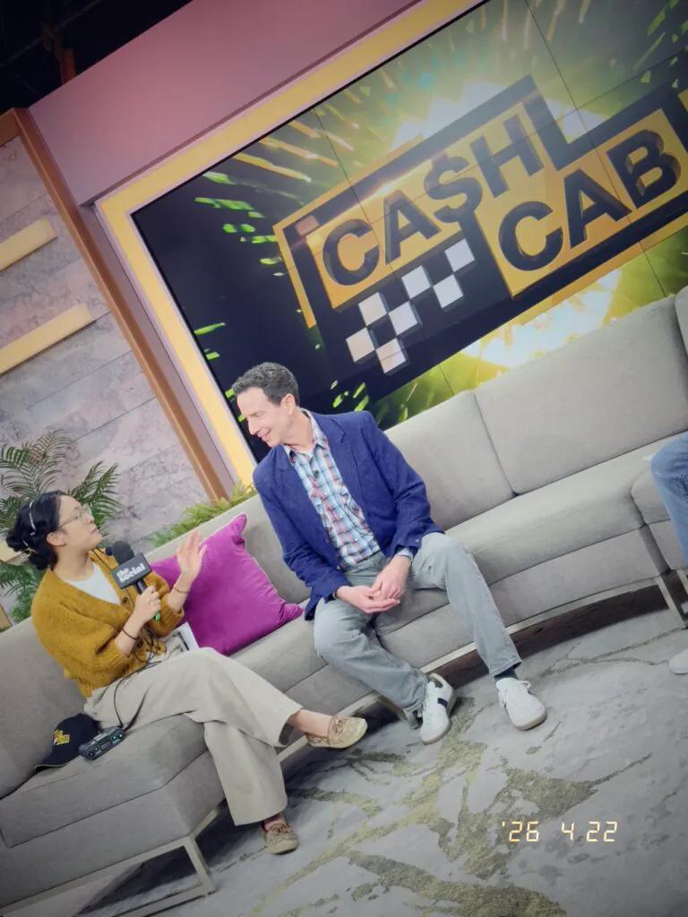 Adam Growe, host of Cash Cab, rehearsing for The Social.