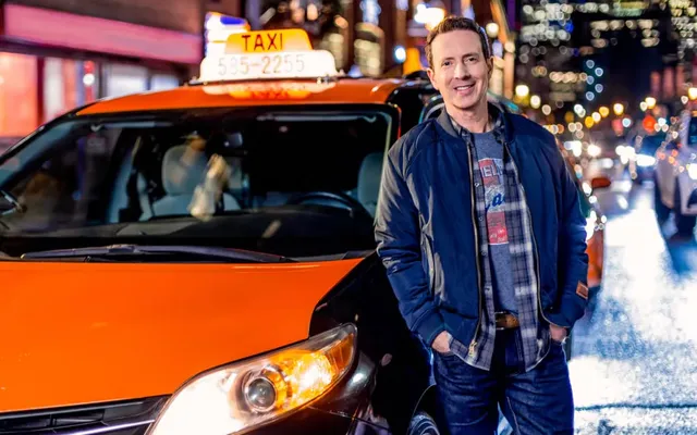 Adam Growe, Host of Cash Cab, Beside the Cab
