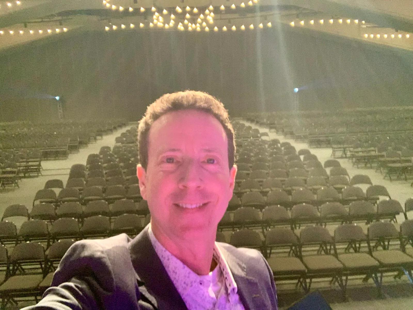 Adam Growe hosting a conference