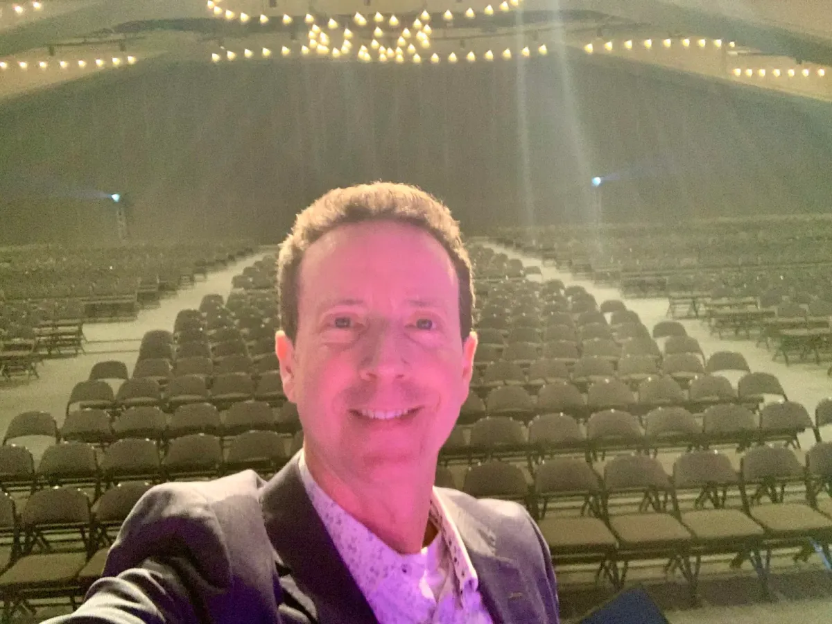 Adam Growe hosting a conference