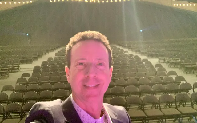 Adam Growe hosting a conference