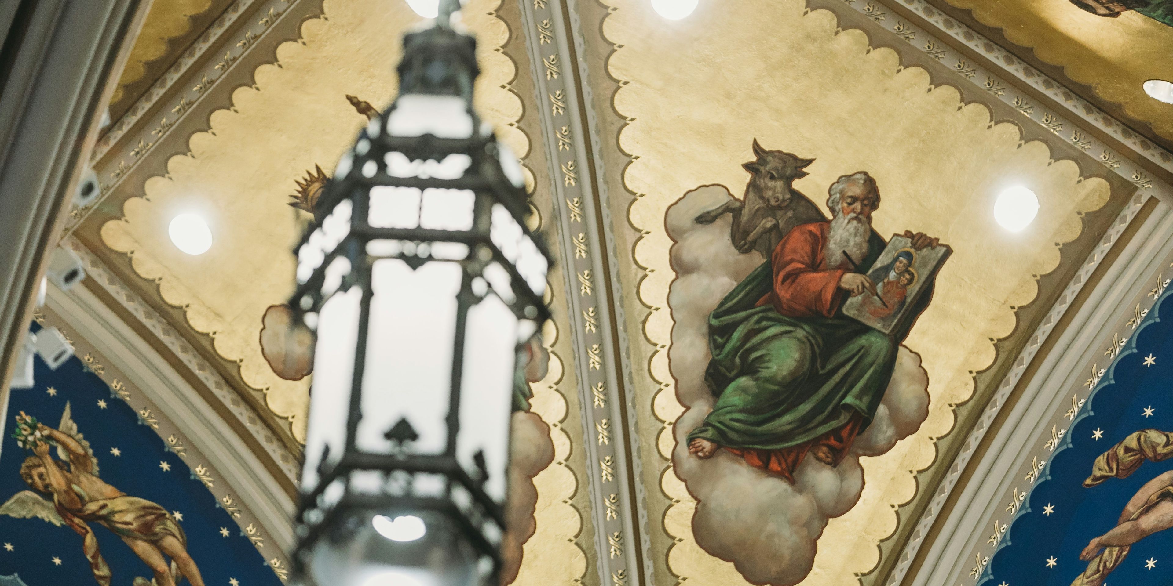 Ceiling Art Behind a Lamp at the Basilica of the Sacred Heart at the University of Notre Dame