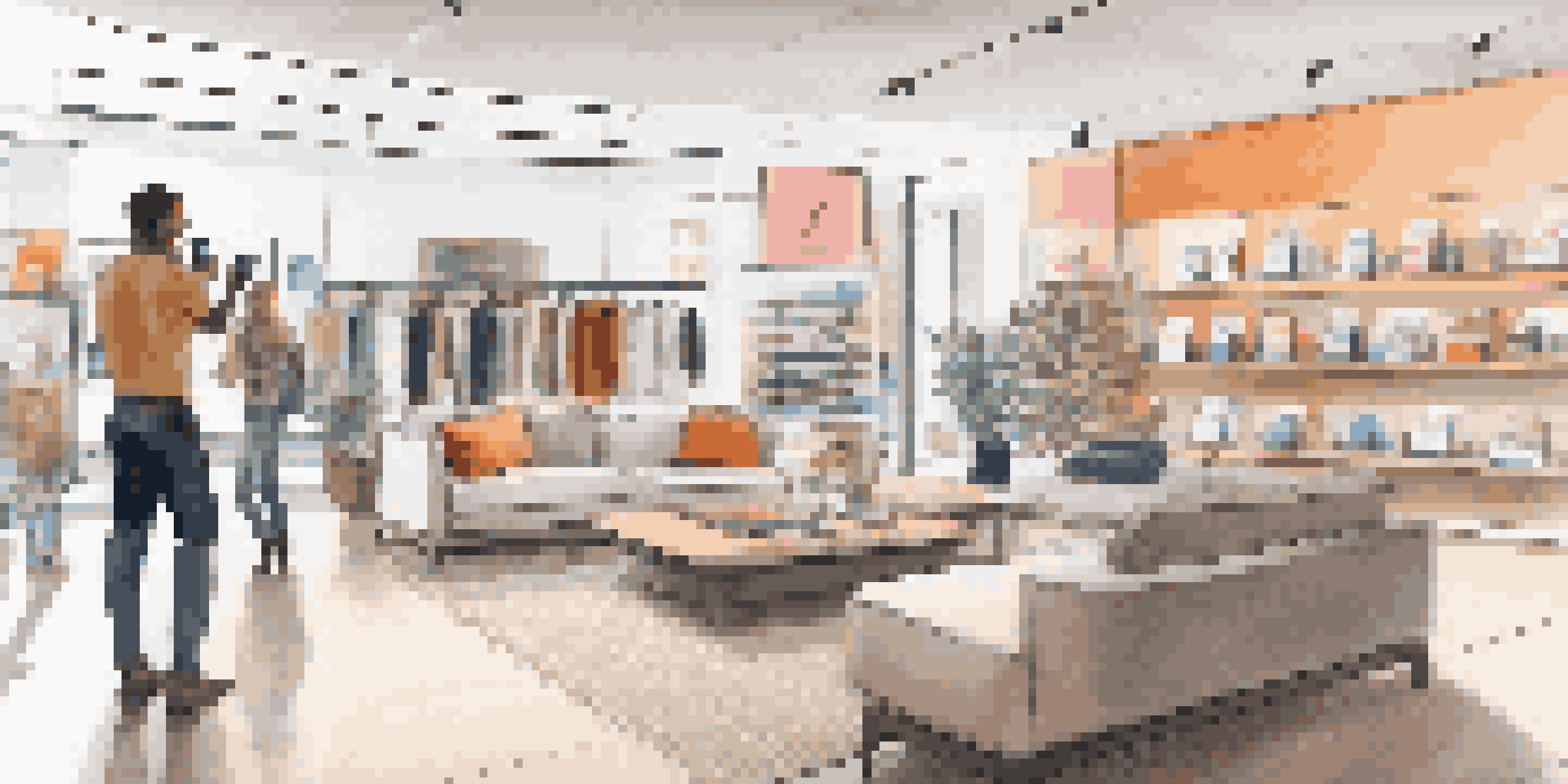 A retail store with customers using smartphones for augmented reality furniture visualization in a living room environment.