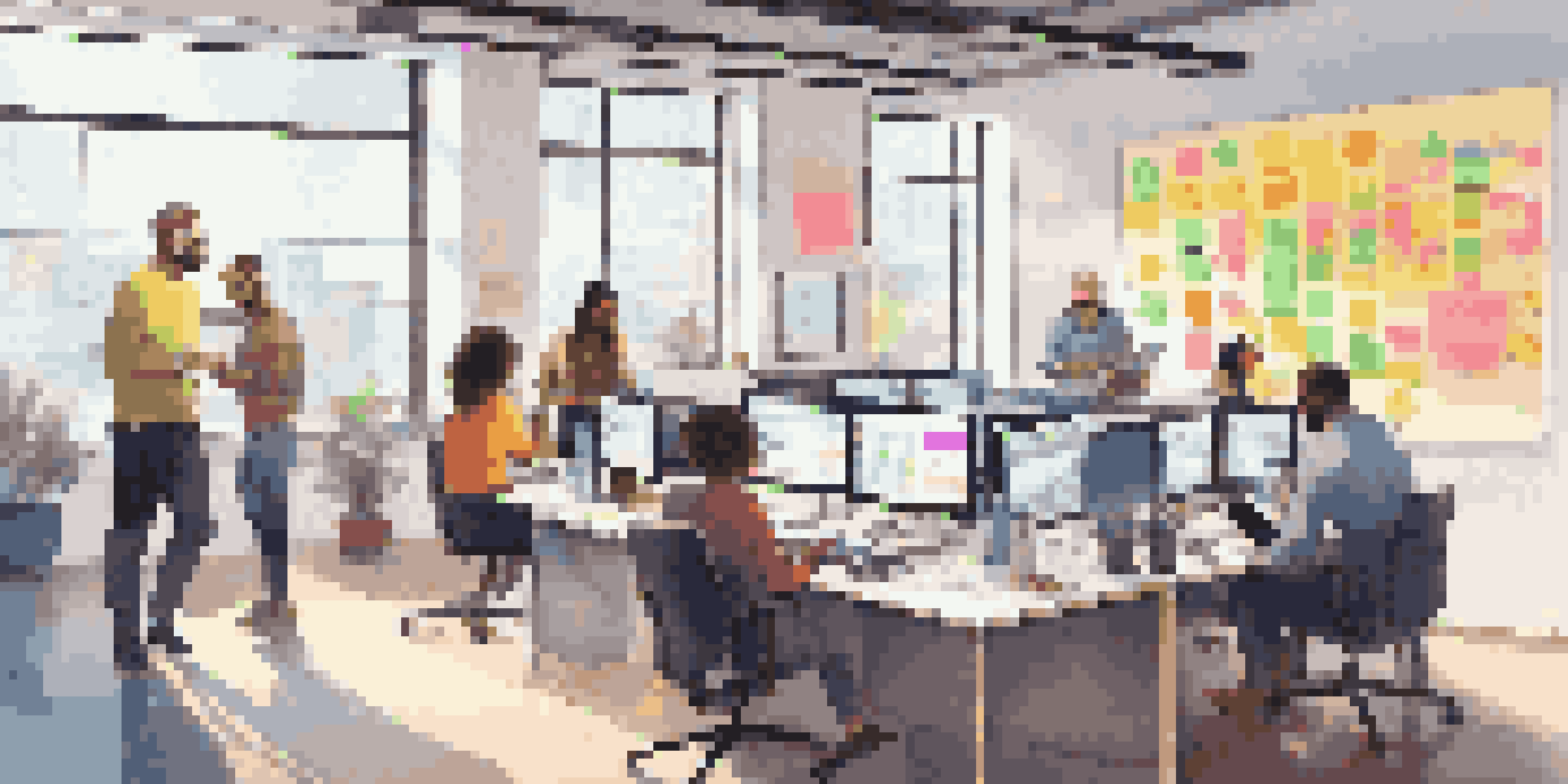 A diverse group of people collaborating in a bright office space with a large touchscreen display and colorful sticky notes.