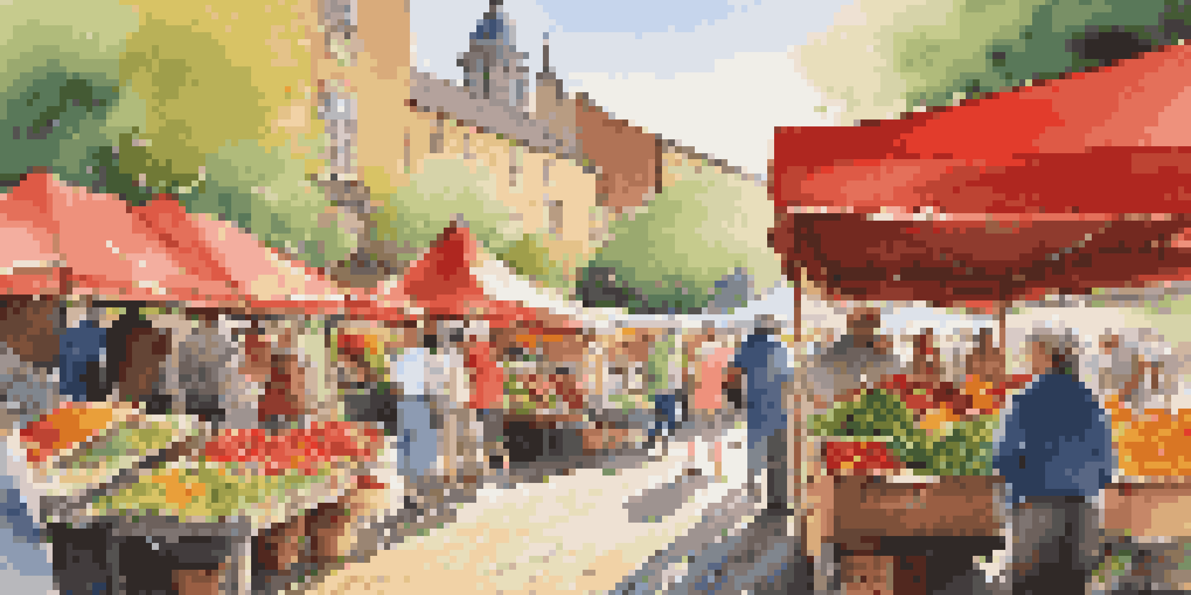 A lively farmer's market with colorful stalls and fresh produce, filled with people shopping and interacting with vendors.