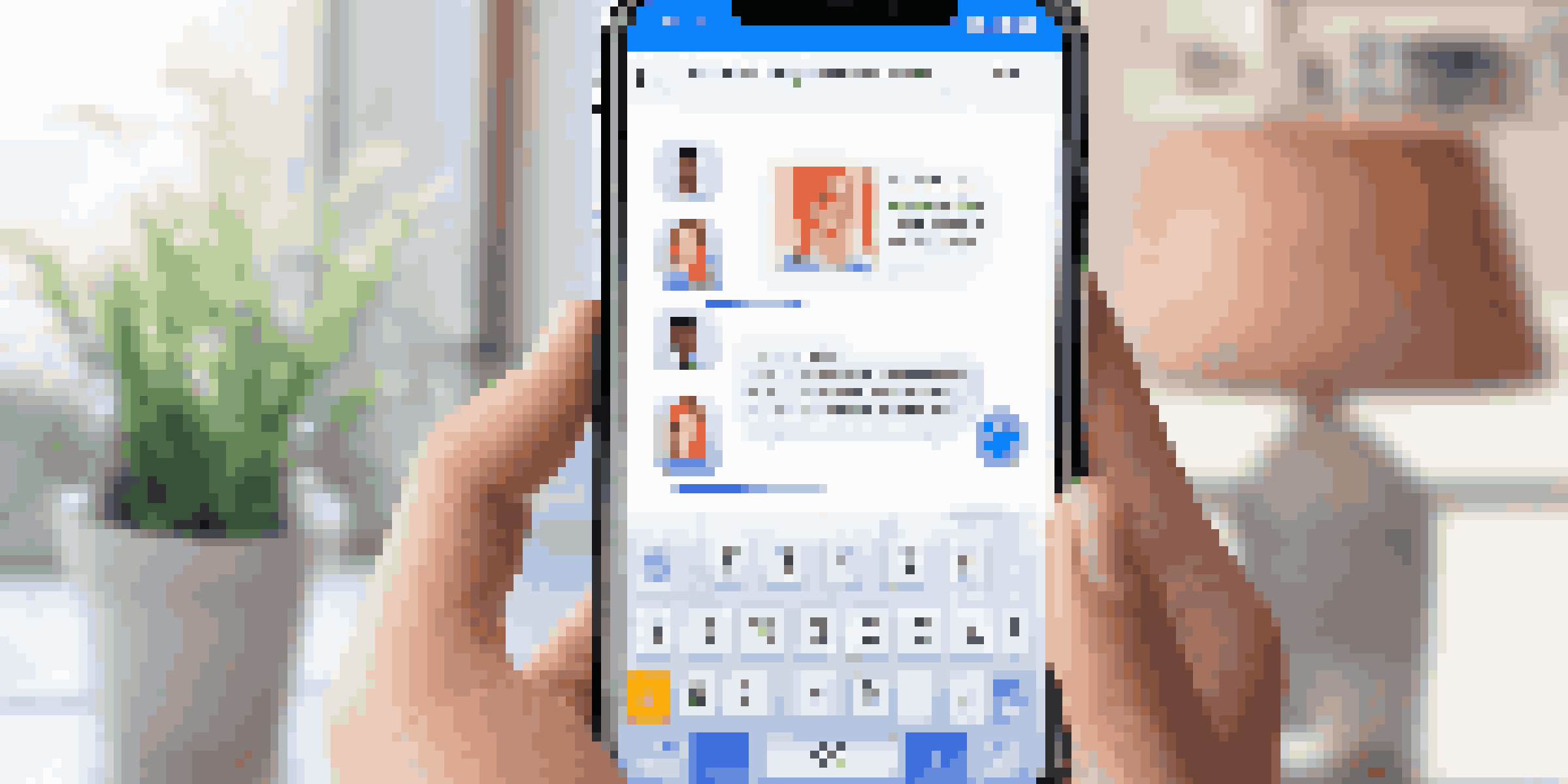 A modern smartphone displaying a chatbot interface with a friendly conversation and product visuals, set in a bright workspace.