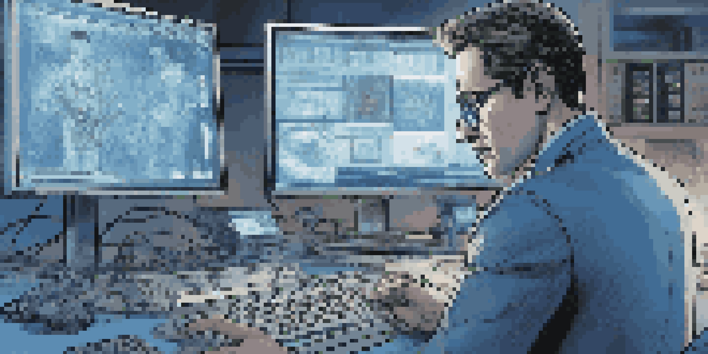 A digital forensic investigator focused on a computer screen displaying data recovery software, surrounded by tools in a modern, well-lit environment.