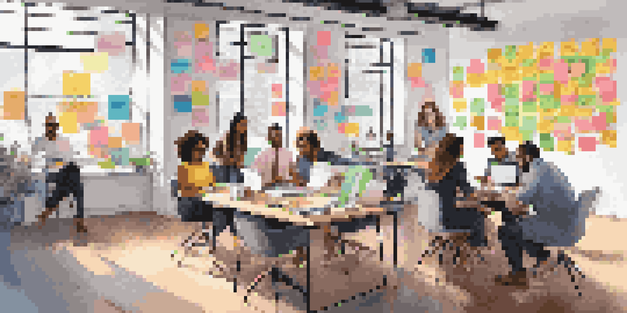 A diverse group of young professionals collaborating in a bright workspace filled with post-it notes and laptops, illuminated by natural light.