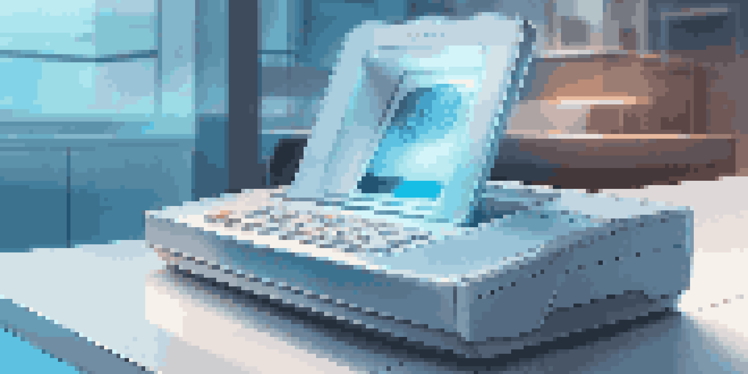 A high-tech biometric scanner with a fingerprint reader and facial recognition camera on a modern desk, glowing blue in a bright environment.
