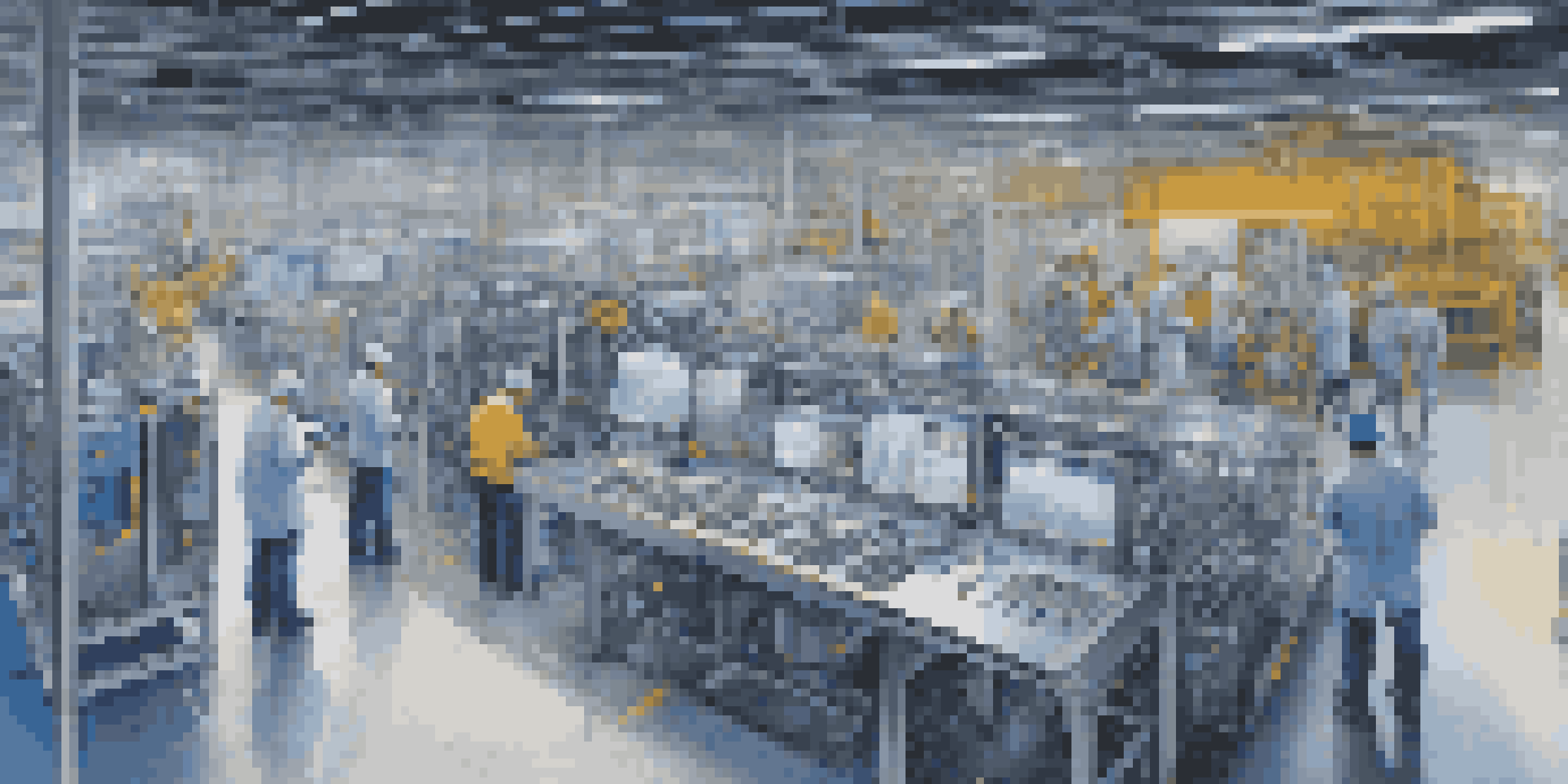 A modern factory floor with advanced machinery and technicians checking data on digital tablets in a bright, high-tech environment.