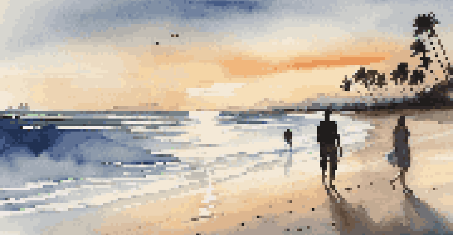 A sunset view over the beach with waves, palm trees, and a couple walking.