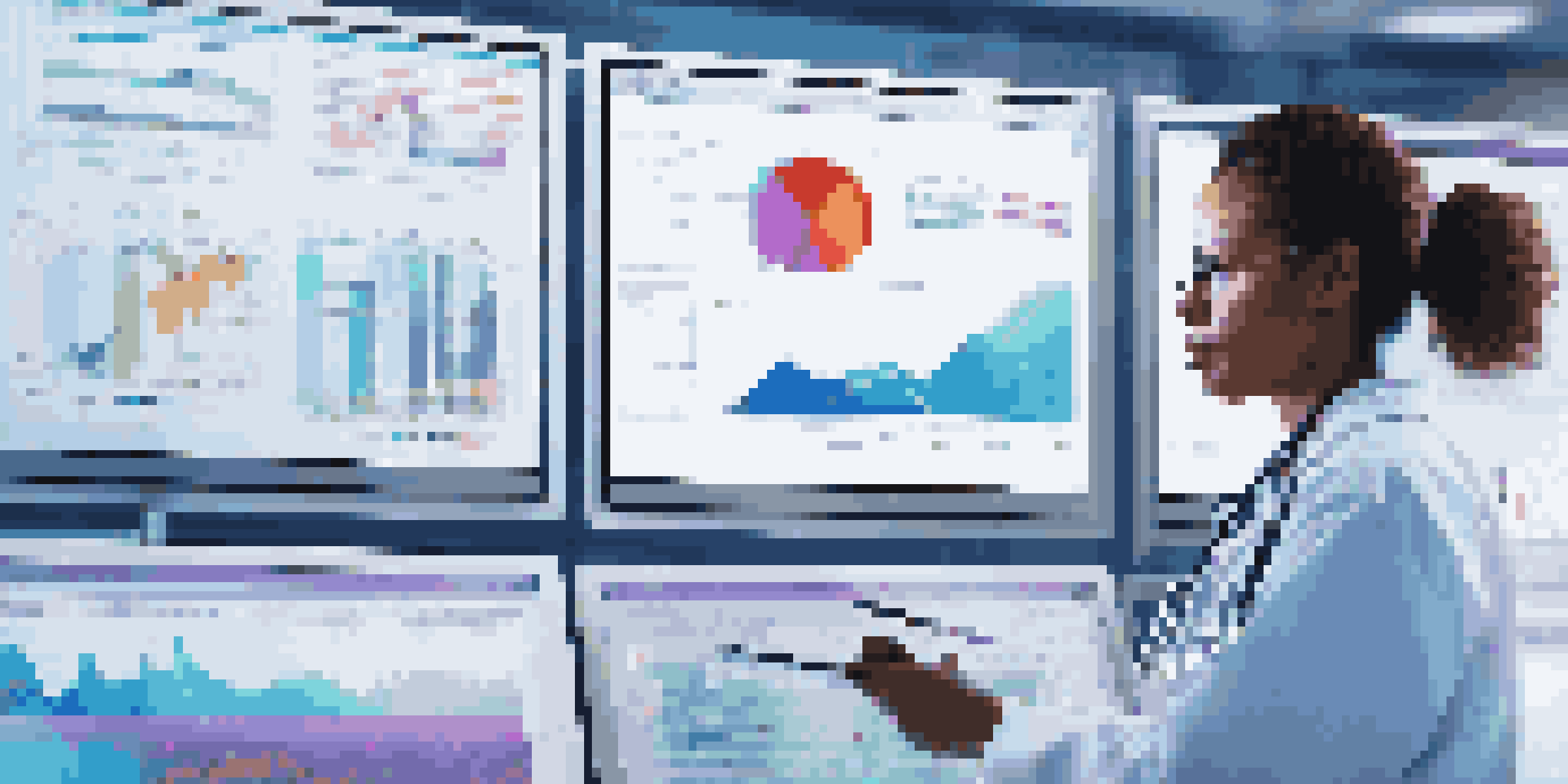 A healthcare worker examining data on a large display, showcasing vibrant graphs in a well-lit hospital environment.
