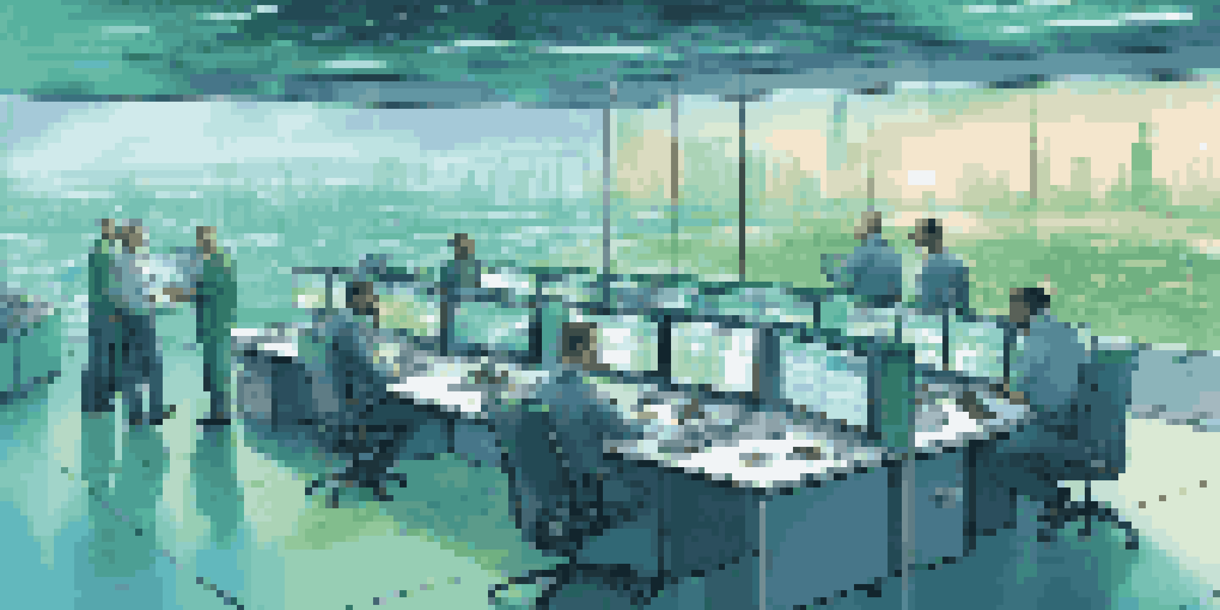 A control room with logistics managers working on real-time data, multiple screens, and a city view.