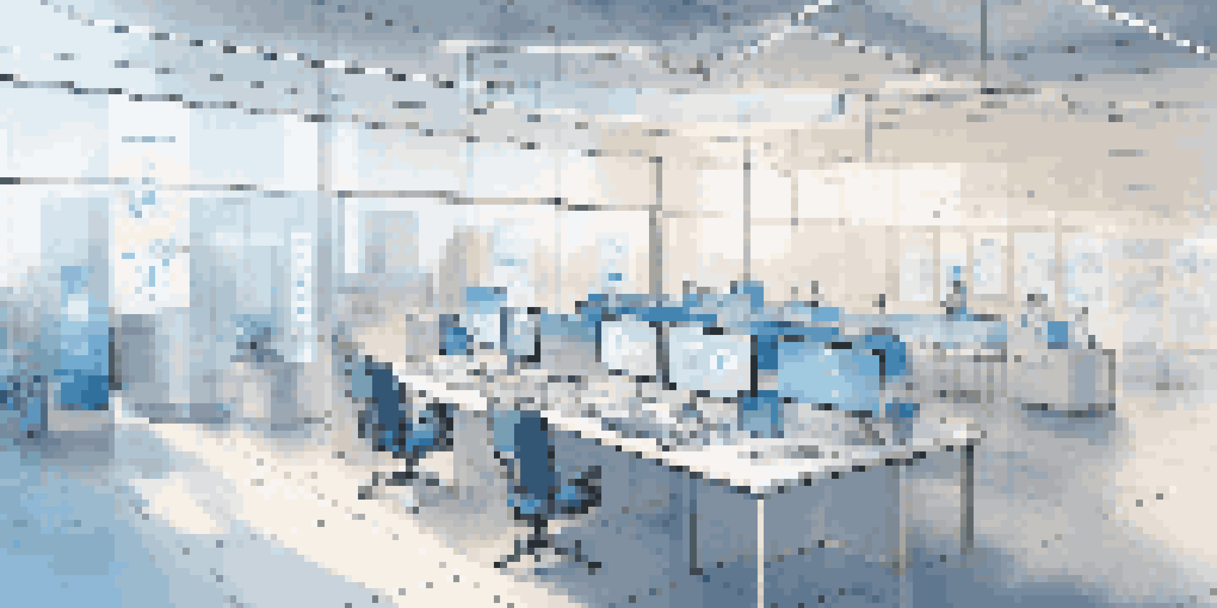 A bright modern office with a digital screen displaying interconnected service icons related to microservices architecture.