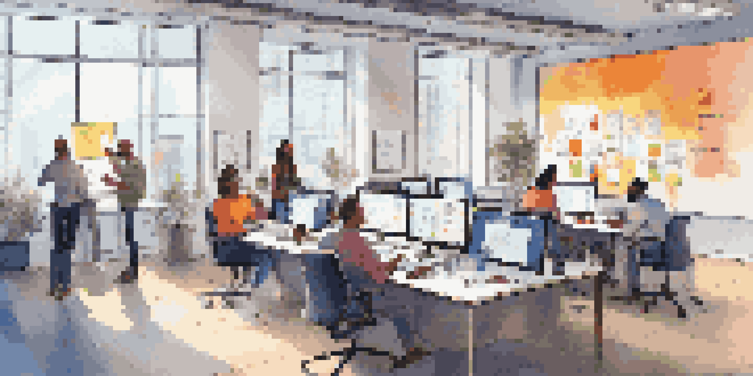 A diverse group of professionals collaborating in a bright office space, surrounded by laptops and sticky notes while brainstorming on a whiteboard.