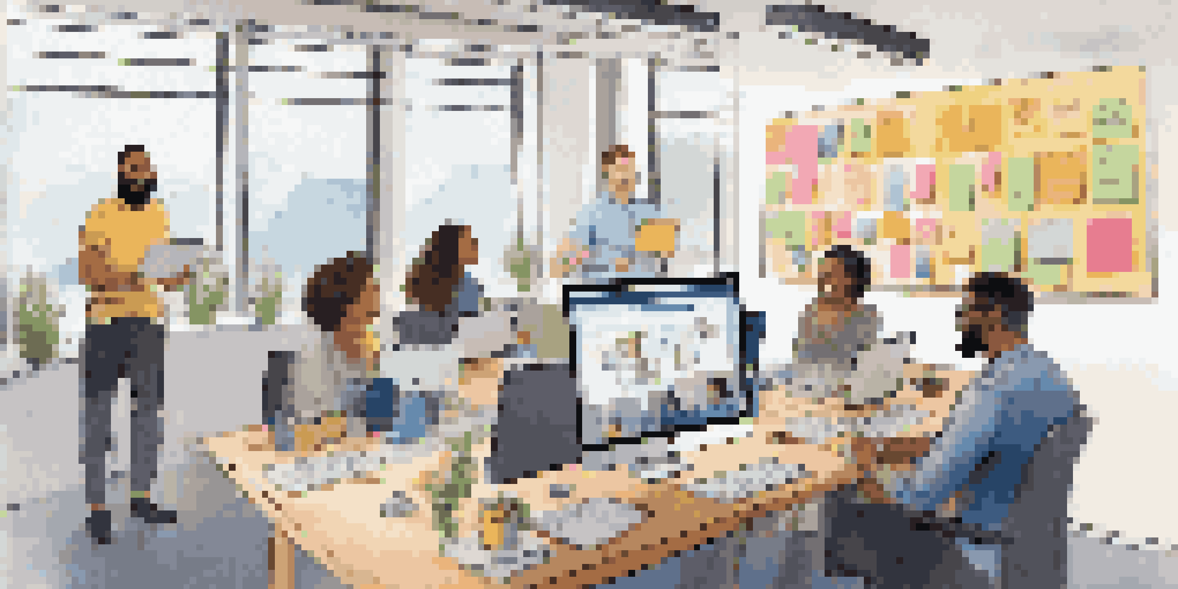 A diverse team of professionals participating in a video conference with a large screen showing smiling faces. The workspace has colorful sticky notes and collaborative tools in the background, illuminated by soft natural light.