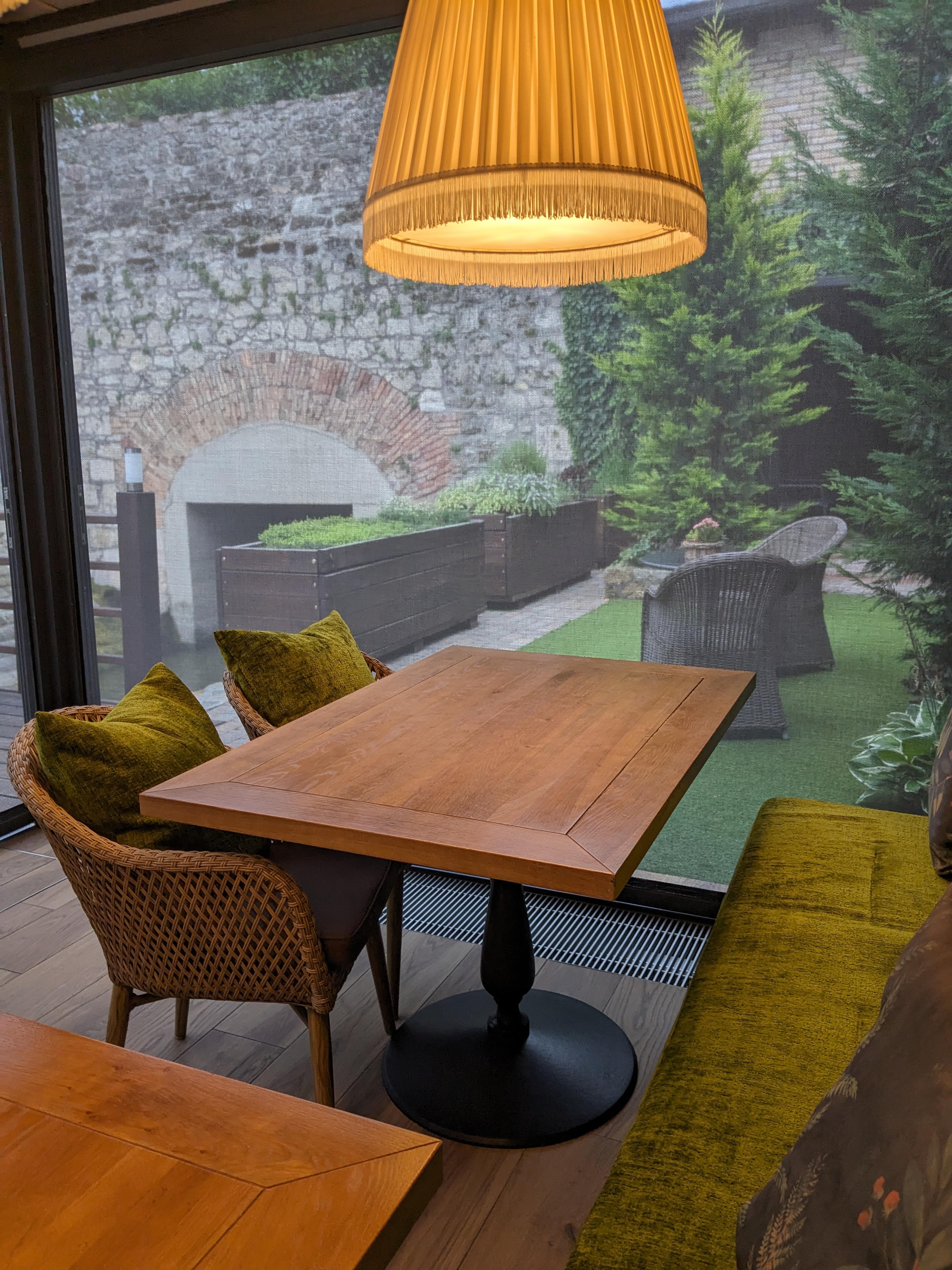 Garden-view table at Platán Gourmet