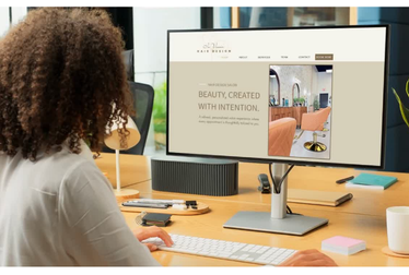 woman looking at cutom designed website