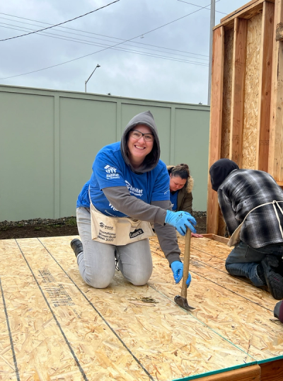 A volunteer working on a Women Build day on Habitat's construction site 
