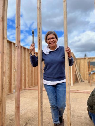 Habitat Homebuyer completing hours as a part of a Women Build day on Habitat's construction site
