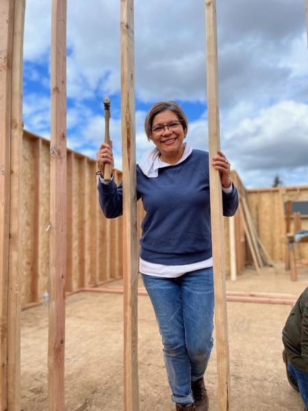 Habitat Homebuyer completing hours as a part of a Women Build day on Habitat's construction site