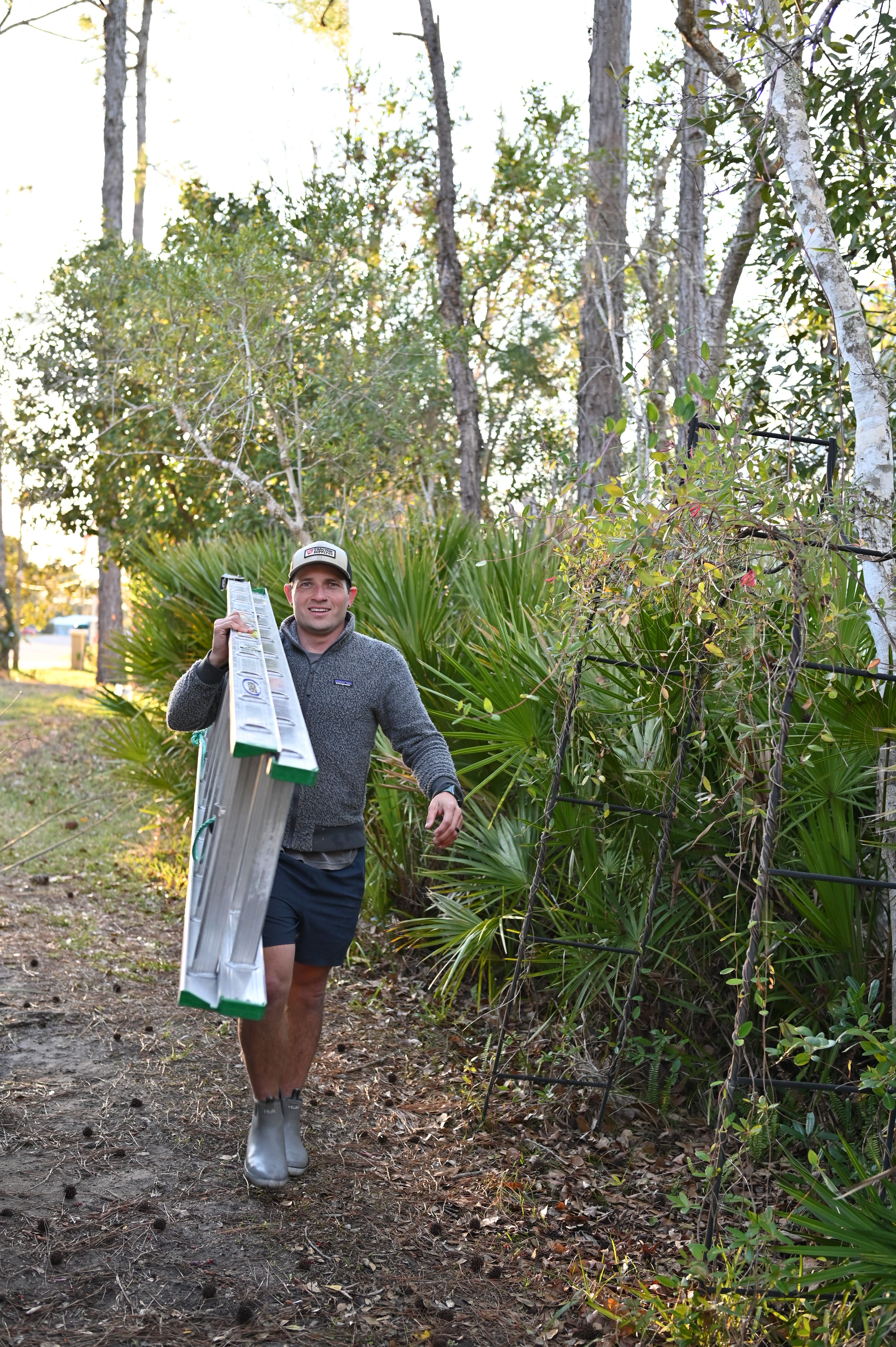 carrying ladder for roof access in st augustine