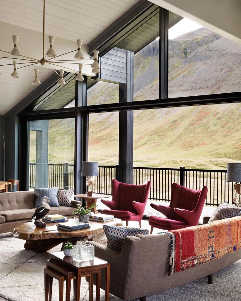 The great room at Deplar Farm with floor-to-ceiling mountain views