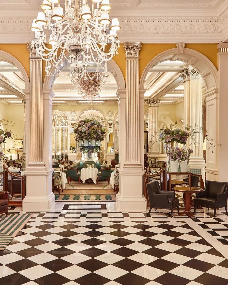 Claridge's Art Deco lobby with its black-and-white checkerboard floor and chandelier