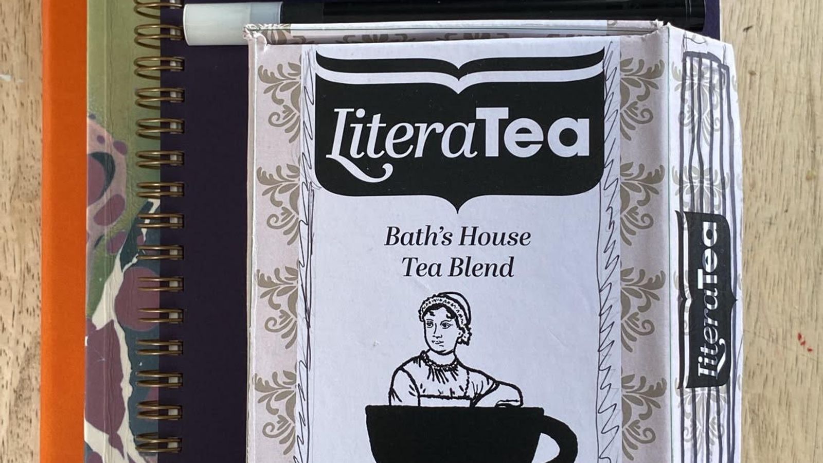 A collection of notebooks, pens and early stage package designds for Literatea