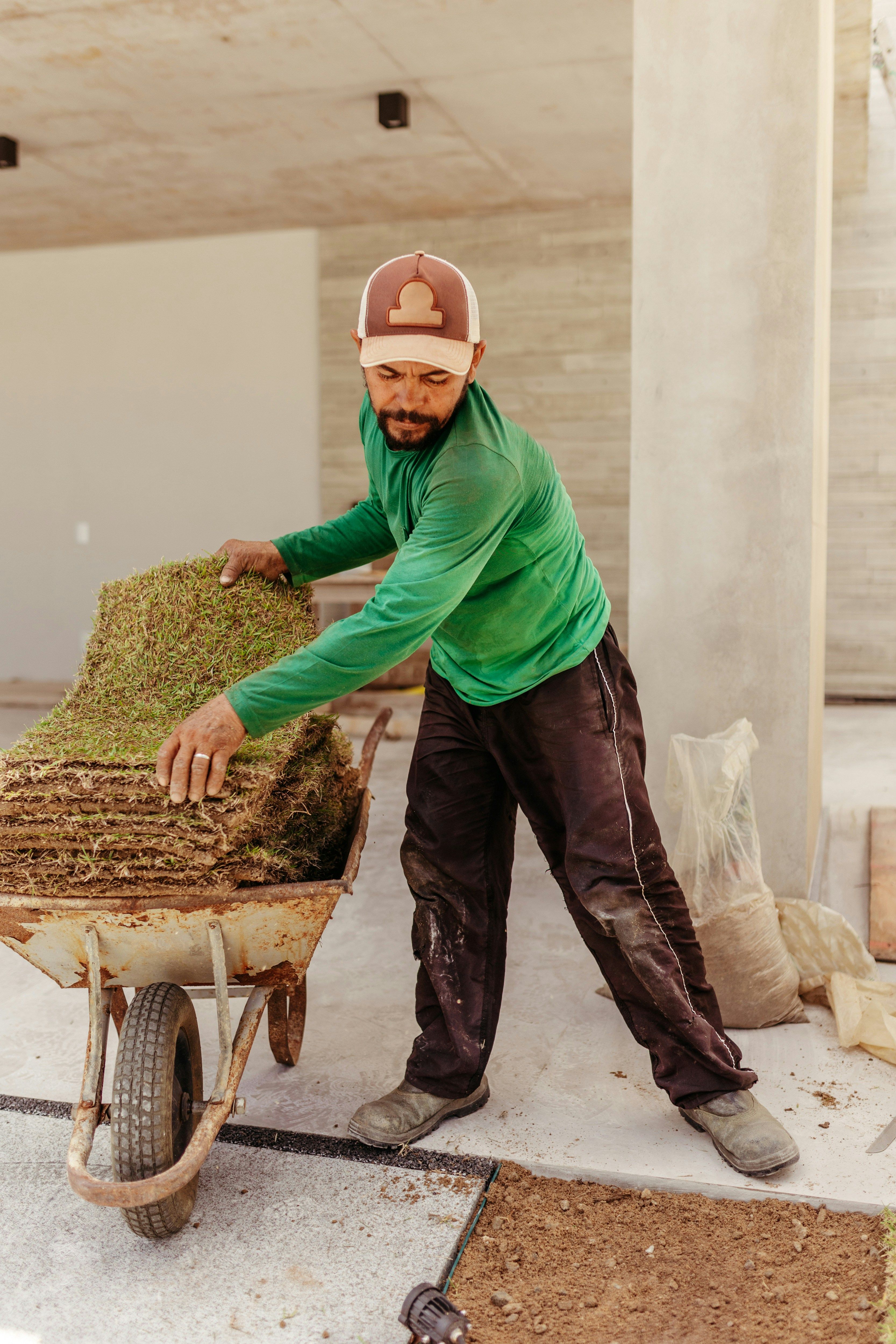 Landscaper watering plants